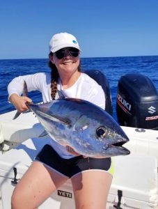 Woman Catching a Blackfin Tuna