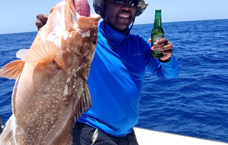 Man with Red Grouper Catch